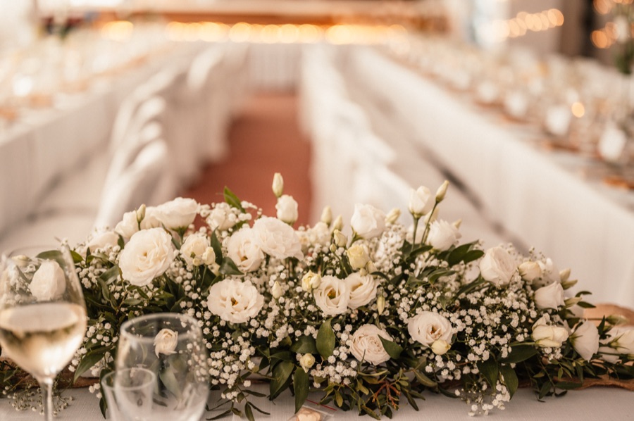 Elegantly decorated wedding reception table setting