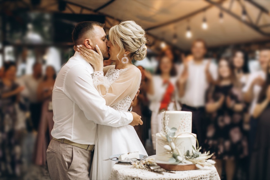 Guests celebrating at an evening wedding event